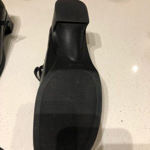 Black Nine West square toe Mary Jane shoes.